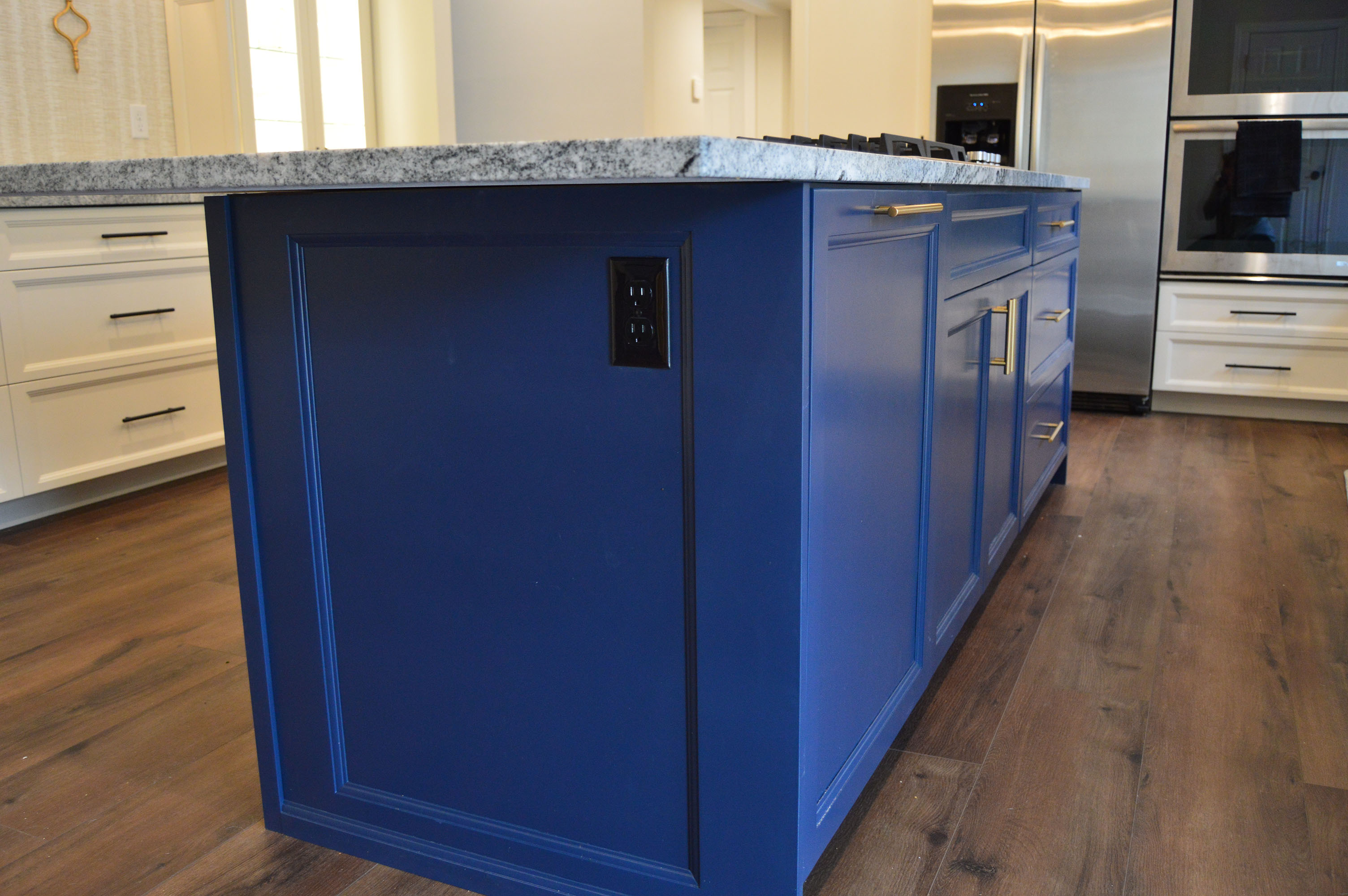 Kitchen remodel with striking blue island - Professional Wood Interiors St. Louis